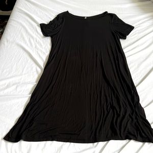 Black stretchy Flowy dress with buttons going down the back